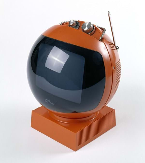 An orange plastic, spherical television set 