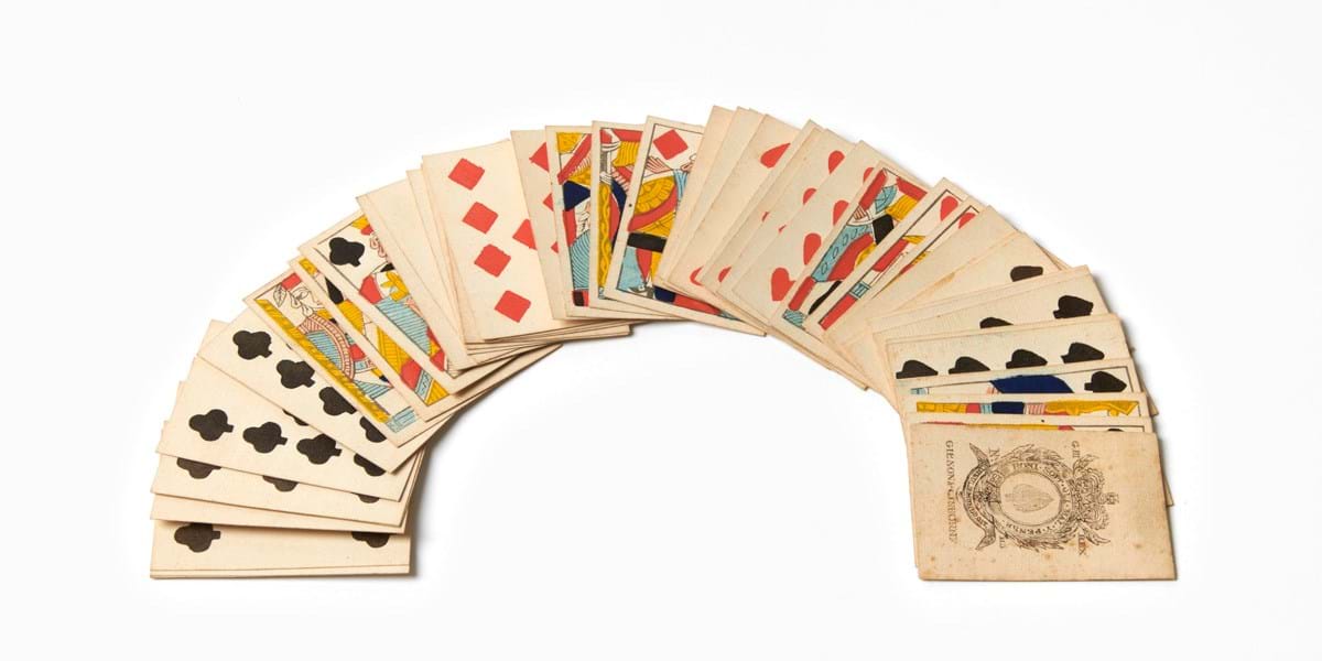 A deck of playing cards layed out in a fan shape