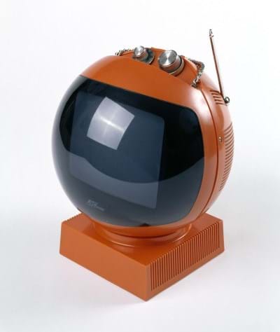 An orange spherical television from the 1970s