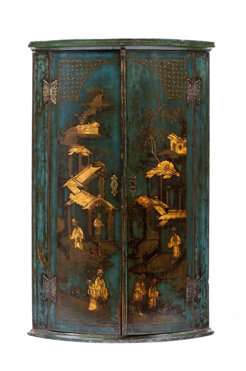 Wooden cabinet painted blue with yellow decoration