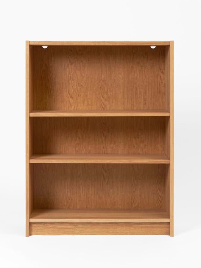 A brown wooden bookcase on a white background