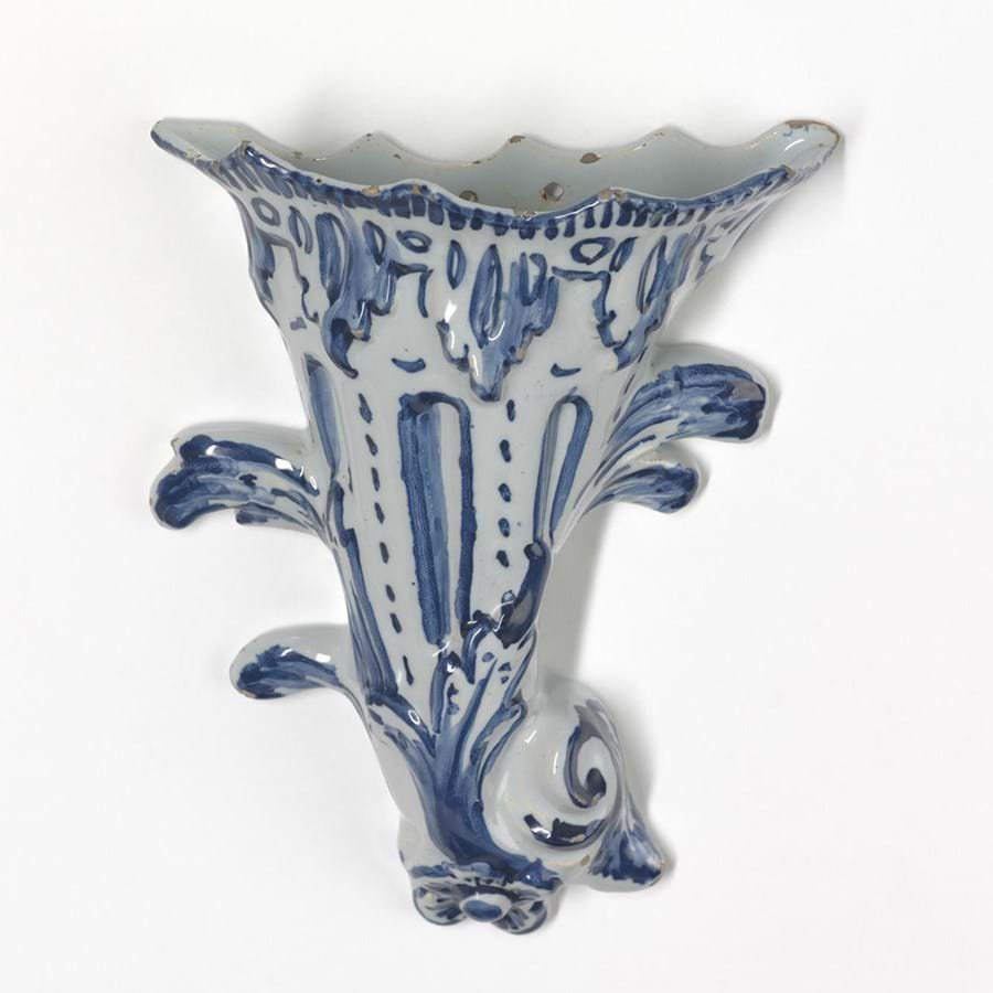 Blue and white ceramic flower horn