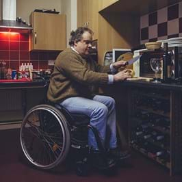 A great view © Jonathan Donovan – person in a wheelchair in their kitchen