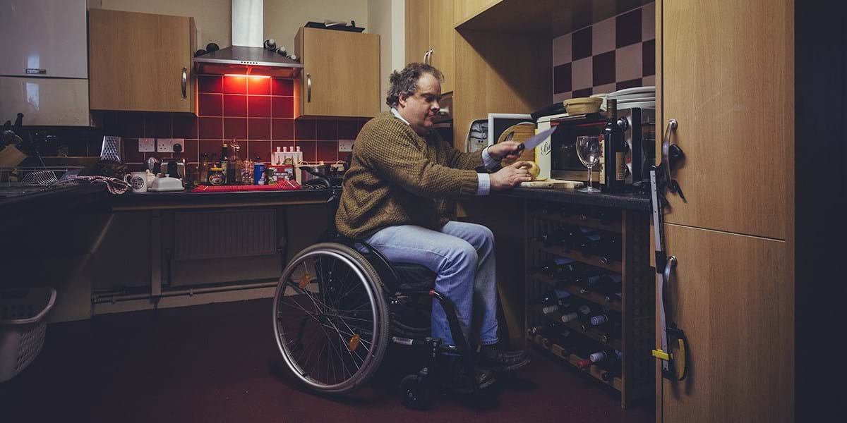 A great view © Jonathan Donovan – person in a wheelchair in their kitchen