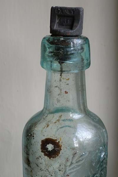 Light blue glass bottle with stopper