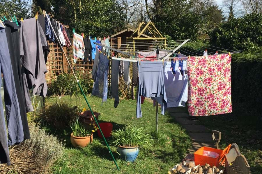 Laundy hanging on a washing line in a garden