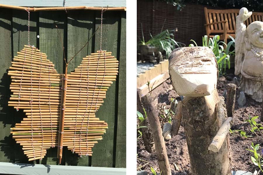 Garden ornaments in the shape of a butterfly and a meerkat 