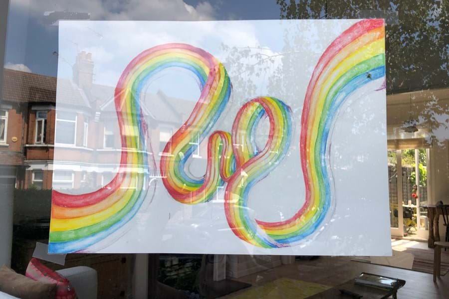 Drawing of a rainbow taking through a window