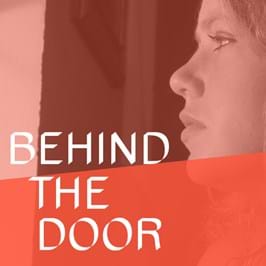 A person looking to the left, with text overlaid that reads 'behind the door'