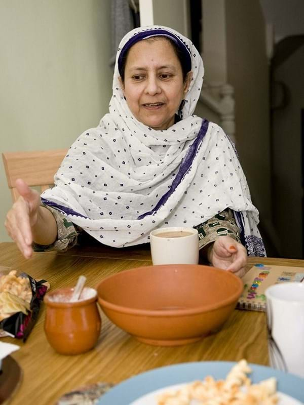 Mrs SA at her kitchen table