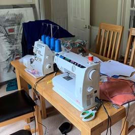 A sewing machine set up on a table