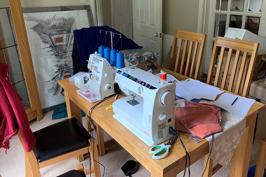 A sewing machine set up on a table