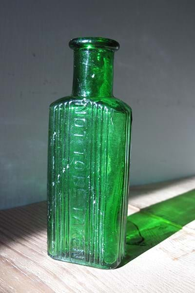 Green glass bottle