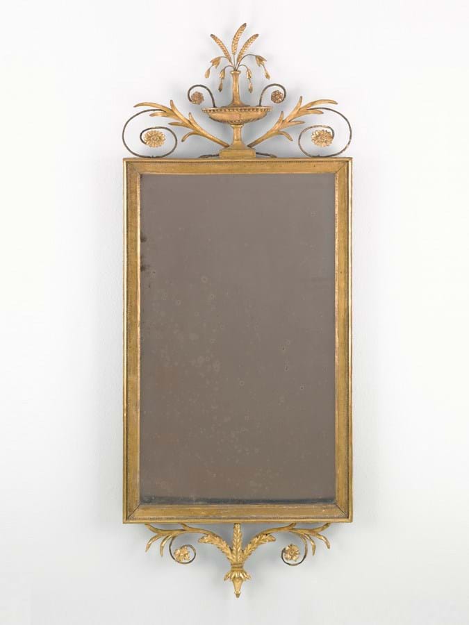 Large rectangular mirror in ornate gold frame