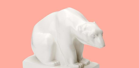 Polar bear figure made from matte white glazed earthenware