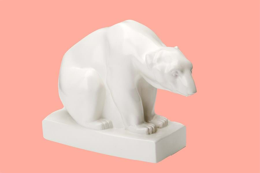 Polar bear figure made from matte white glazed earthenware